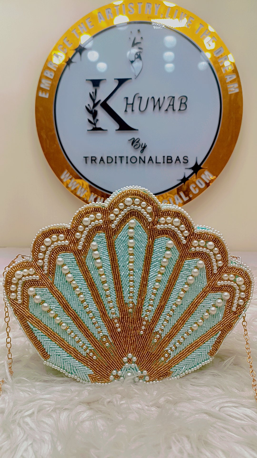 Signature pearl shell purse