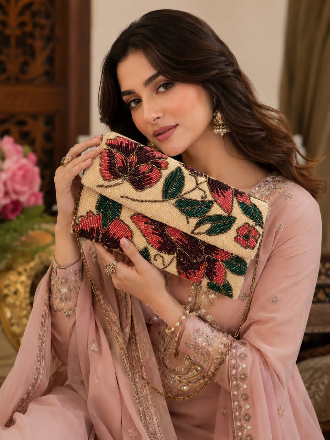 Skin rose beaded clutch