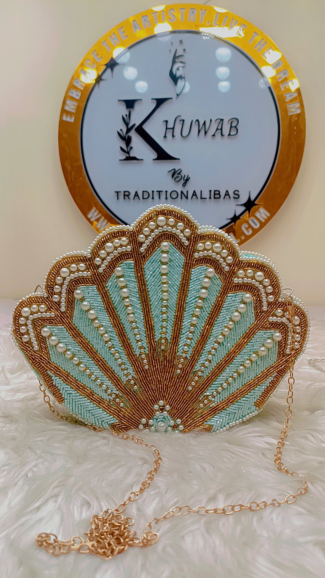 Signature pearl shell purse